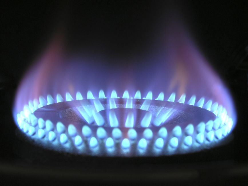 Blue gas flame burning on a hob — the type of appliance checked during a CP12 gas safety inspection in Glasgow
