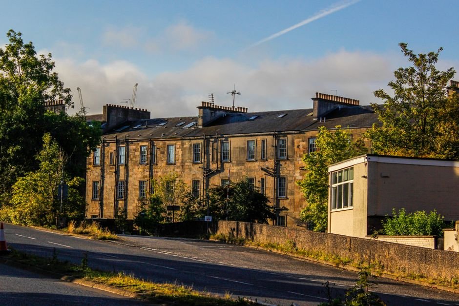 Sandstone tenement and residential buildings typical of Glasgow's Southside, near Cathcart, where older wiring is common