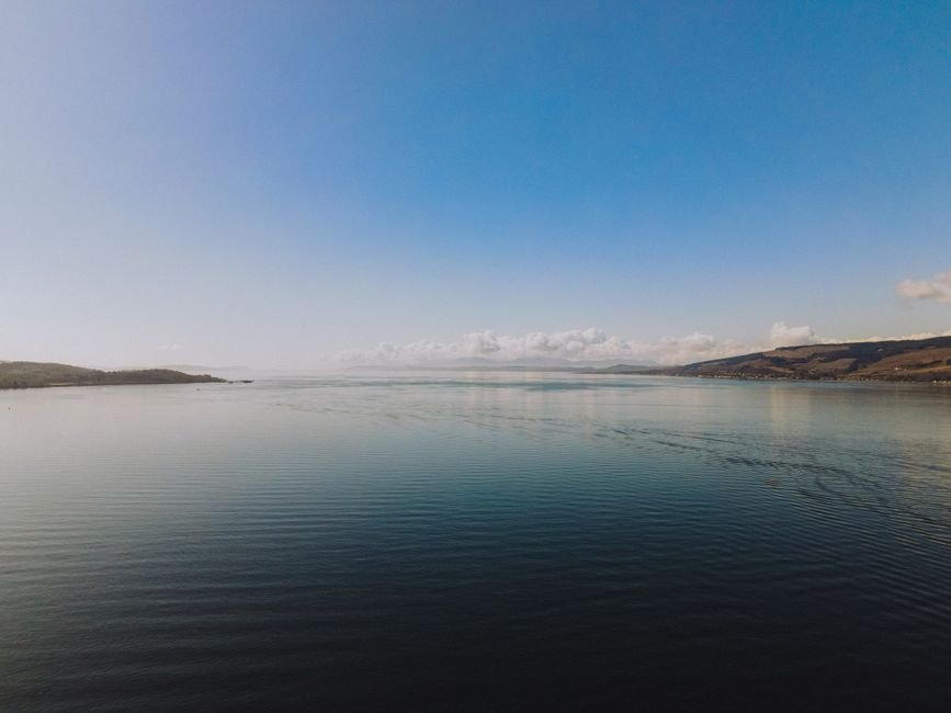 Calm water and hills on the Firth of Clyde estuary, representative of the coastline around Helensburgh
