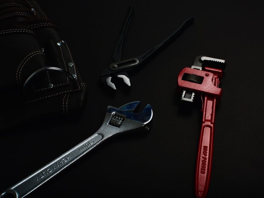 Plumbing hand tools including wrenches used for boiler and pipe work in Troon